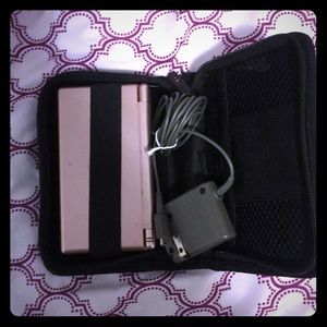 Pink Nintendo DS lite with case and charger